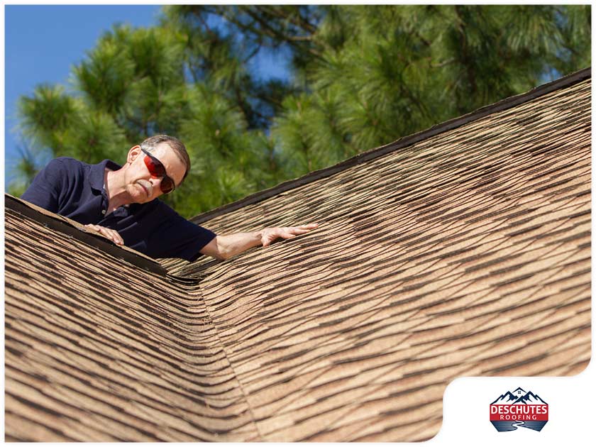 4629 1617769732 Roofer Inspecting Residential Roofing